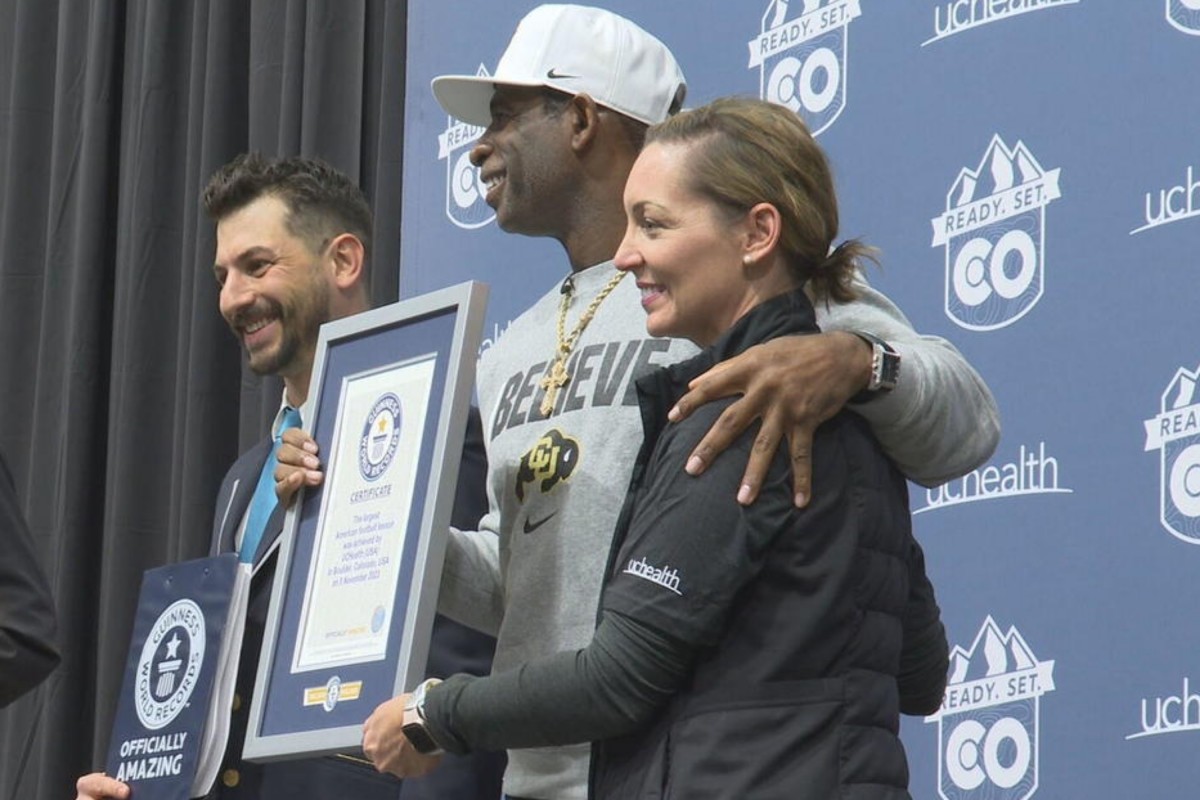 Deion Sanders receiving Guinness World Record at CU