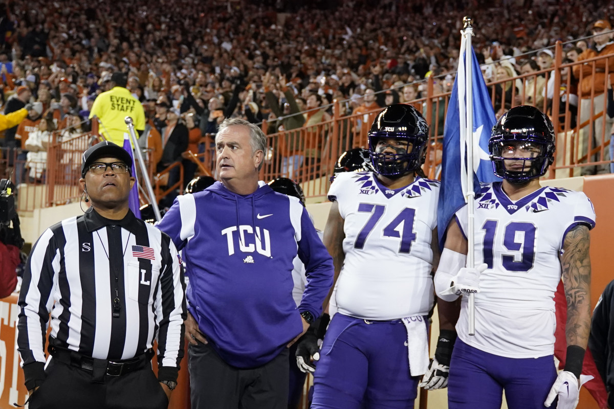 Texas Christian Horned Frogs head coach Sonny Dykes and players wait to take the field before the game against the Texas Longhorns at Darrell K Royal-Texas Memorial Stadium.
