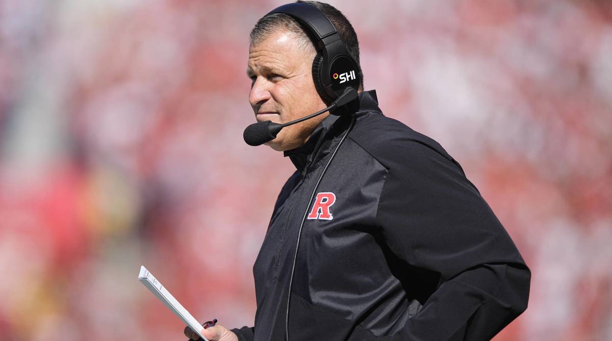 Rutgers head coach Greg Schiano looks on while coaching in a game.