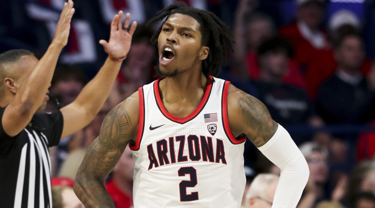 Arizona guard Caleb Love celebrates after a made three-pointer