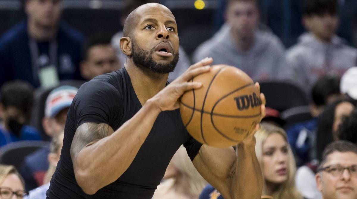 Warriors forward Andre Iguodala shoots a ball in warmups before a game.