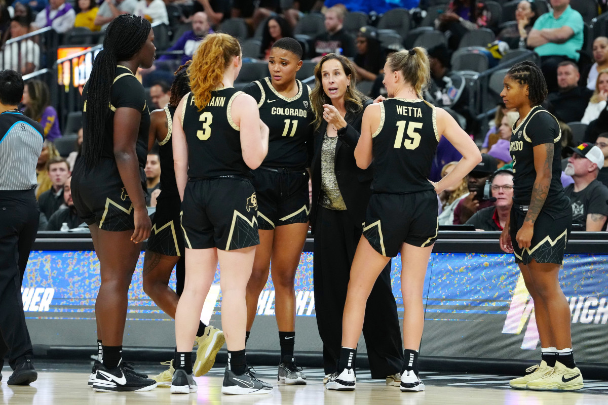 Colorado Buffaloes head coach JR Payne talks to players before a free throw against the LSU Lady Tigers during the fourth quarter at T-Mobile Arena