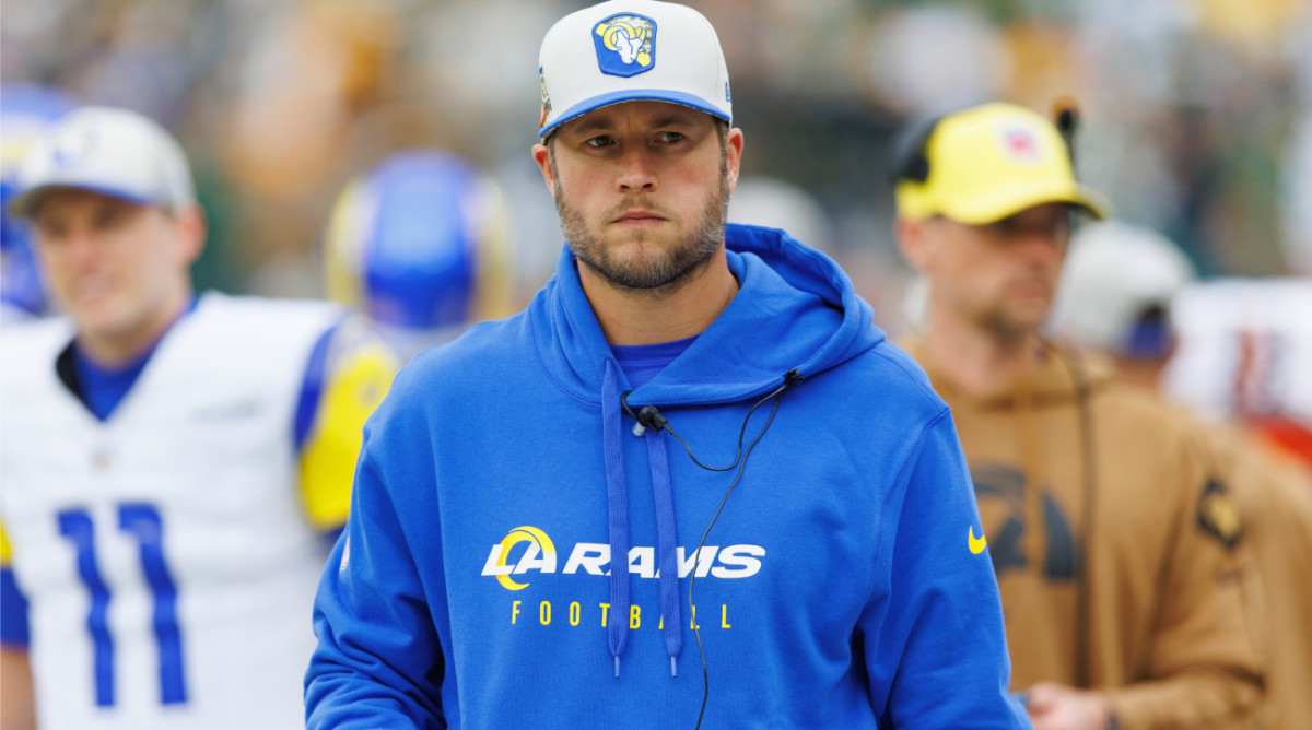 Nov 5, 2023; Green Bay, Wisconsin, USA; Los Angeles Rams quarterback Matthew Stafford looks on from the sidelines prior to the game against the Green Bay Packers at Lambeau Field. Mandatory Credit: Jeff Hanisch-USA TODAY Sports  