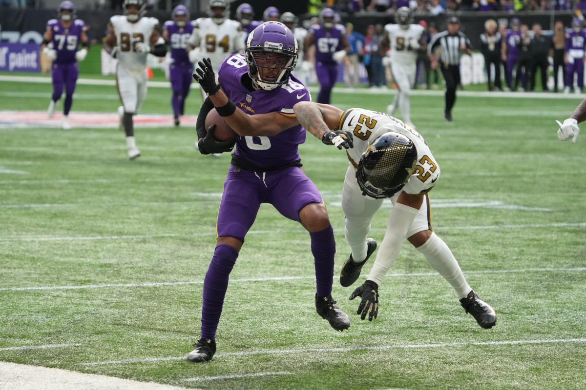 Oct 2, 2022; Minnesota Vikings receiver Justin Jefferson (18) catches the ball against New Orleans Saints cornerback Marshon Lattimore (23). Mandatory Credit: Kirby Lee-USA TODAY