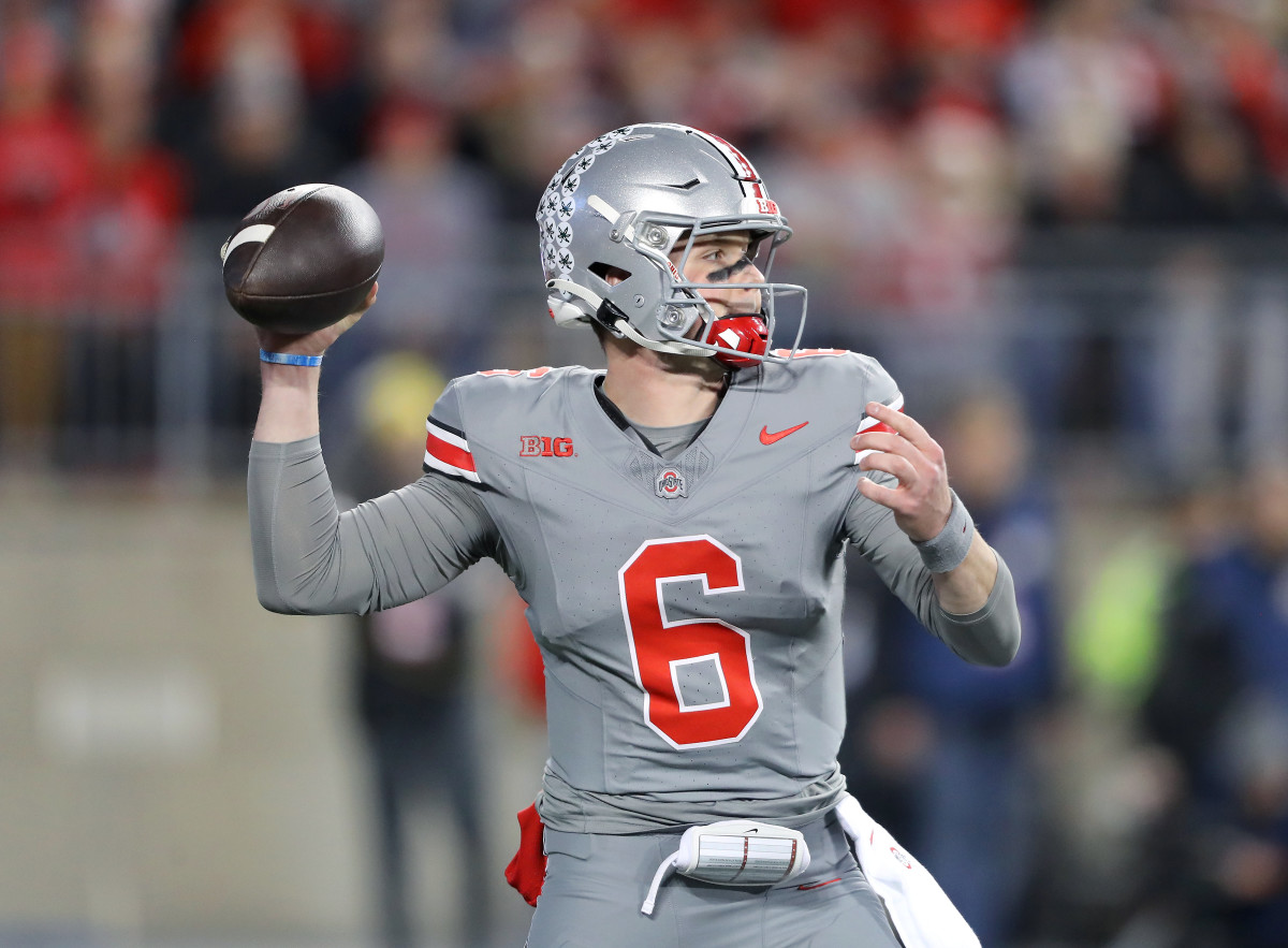 Ohio State Buckeyes quarterback Kyle McCord (6) drops back to throw during the first quarter against the Michigan State Spartans at Ohio Stadium.