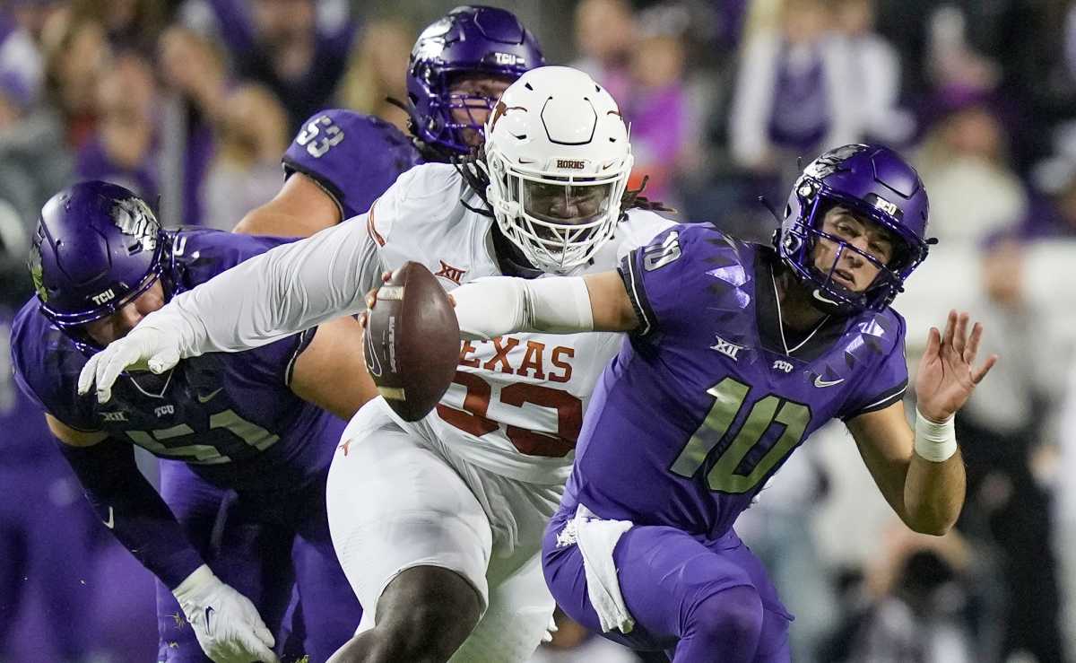 Texas Longhorns defensive lineman T'Vondre Sweat (93) sacks TCU Horned Frogs quarterback Josh Hoover (10) in the first quarter of an NCAA college football game, Saturday, November. 11, 2023, at Amon G...