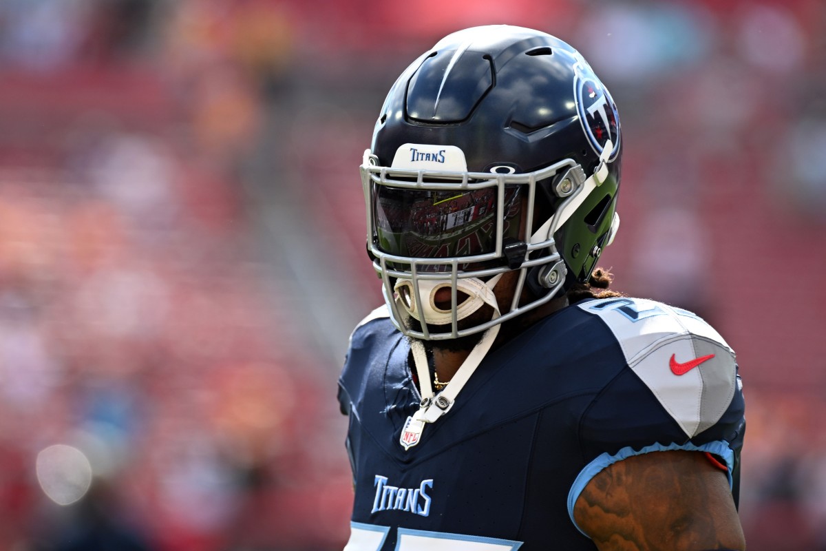 Tennessee Titans running back Derrick Henry (22) warms up before the start of the game against the Tampa Bay Buccaneers at Raymond James Stadium.