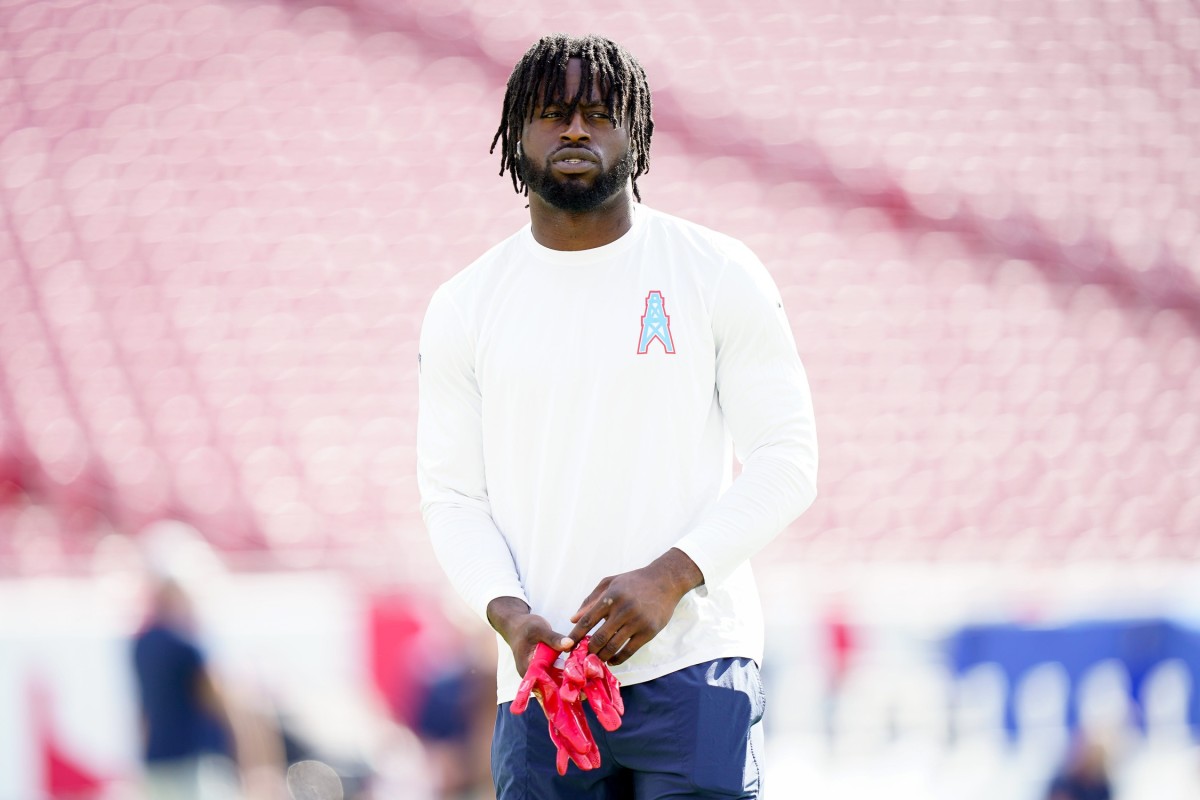 Tennessee Titans tight end Chigoziem Okonkwo warms up before a game against the Tampa Bay Buccaneers at Raymond James Stadium.