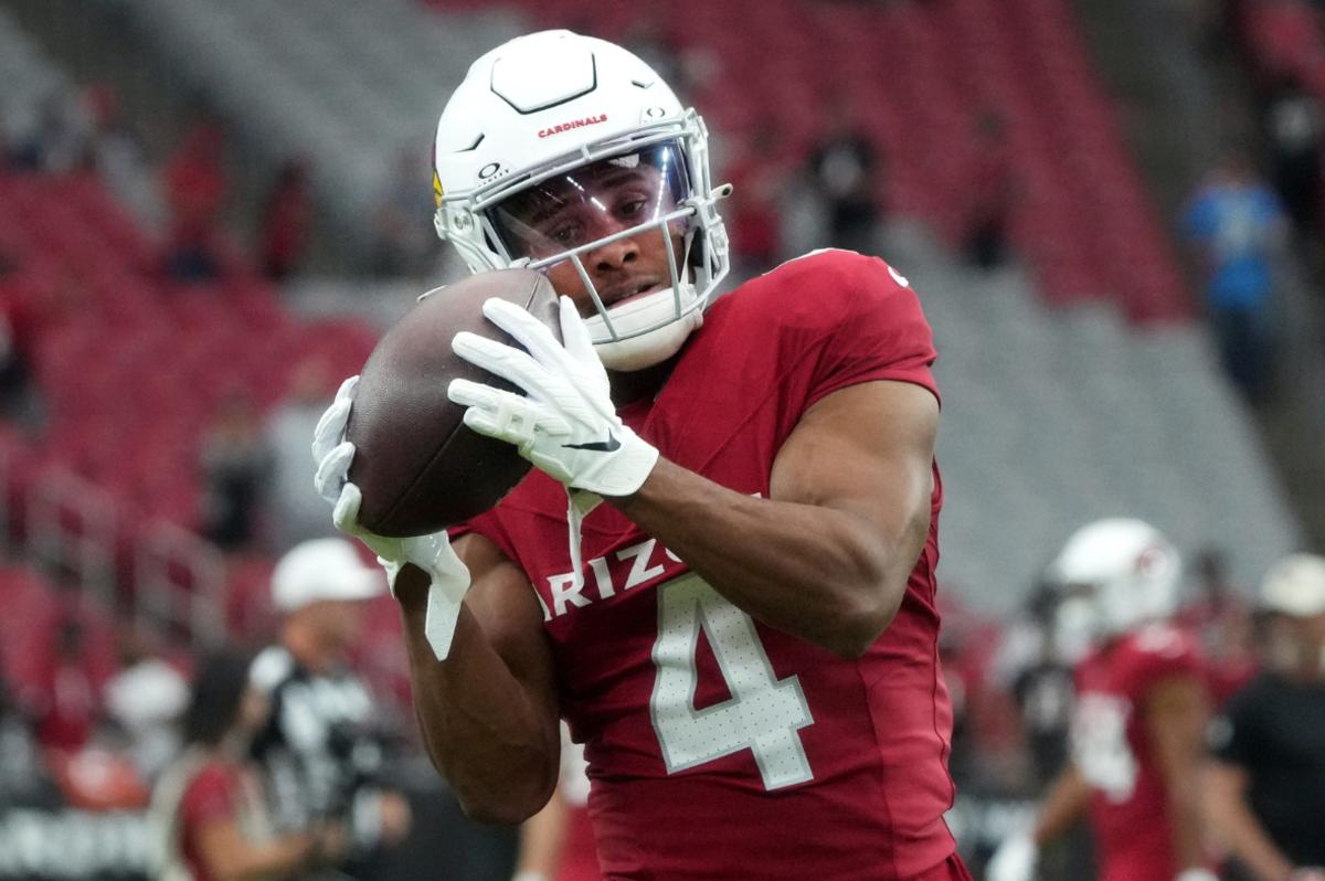 Arizona Cardinals receiver Rondale Moore (4) warms up before their game against the Atlanta Falcons at State Farm Stadium.