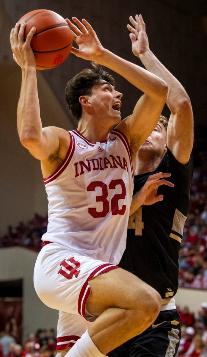 Indiana's Trey Gralloway (32) shoots over Army's Abe Johnson (54) during the first half of the Indiana versus Army men's basketball game.