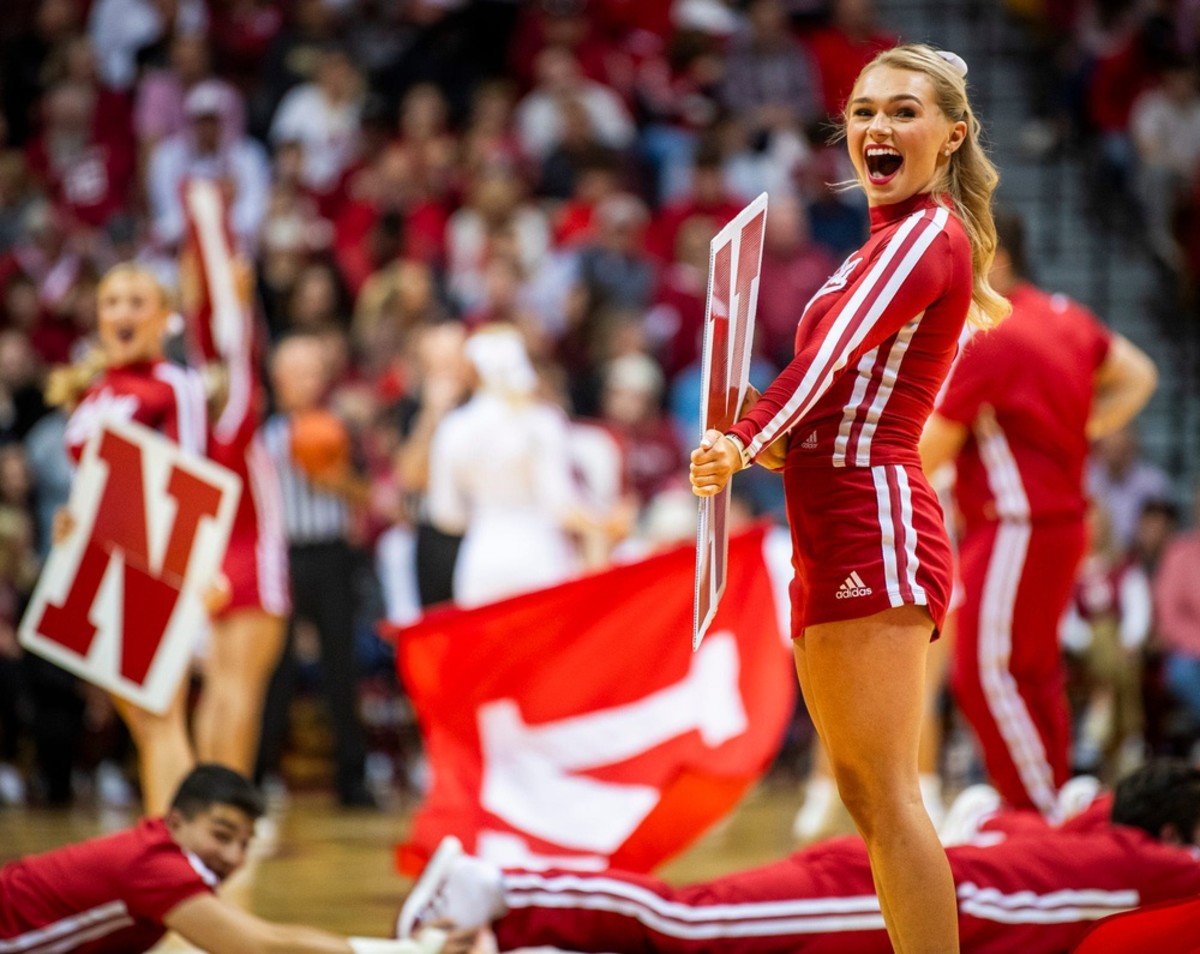 Indiana cheerleader Kaitlyn Burns cheers during the first half of the Indiana versus Army men's basketball game.  