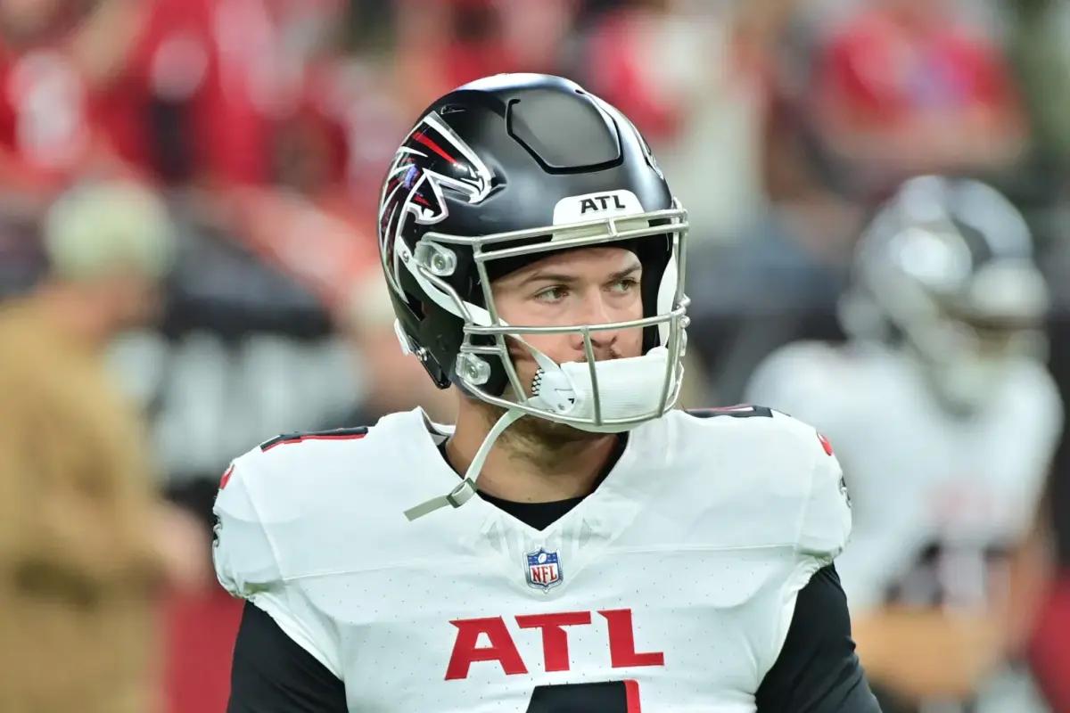 Nov 12, 2023; Glendale, Arizona, USA; Atlanta Falcons quarterback Taylor Heinicke (4) warms up prior to the game against the Arizona Cardinals at State Farm Stadium.