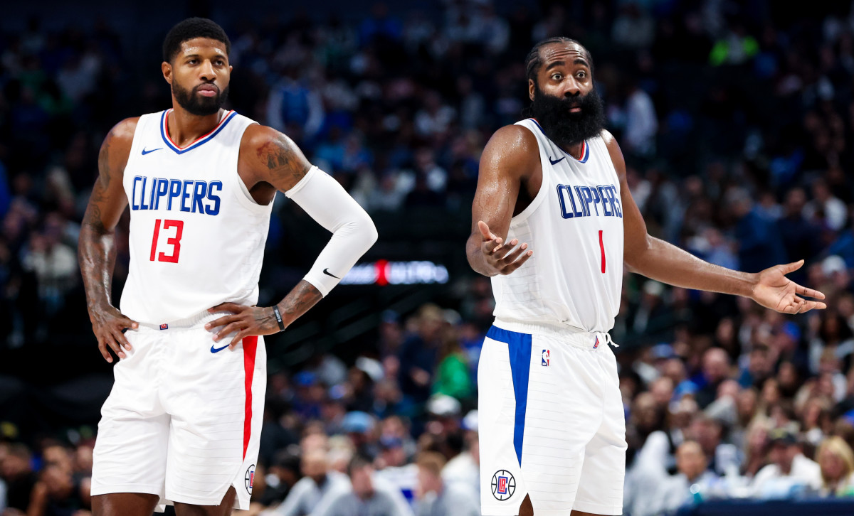LA Clippers guard James Harden and Clippers forward Paul George react during the second half against the Dallas Mavericks at American Airlines Center.