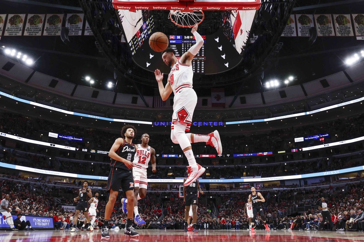 Chicago Bulls guard Zach LaVine (8) scores against the Detroit Pistons during the first half at United Center.