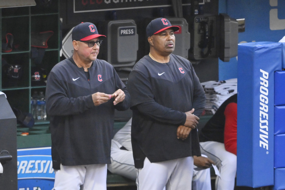 Jun 7, 2022; Cleveland, Ohio, USA; Cleveland Guardians manager Terry Francona (77) and bench coach DeMarlo Hale (30) stand in the dugout in the second inning against the Texas Rangers at Progressive Field.