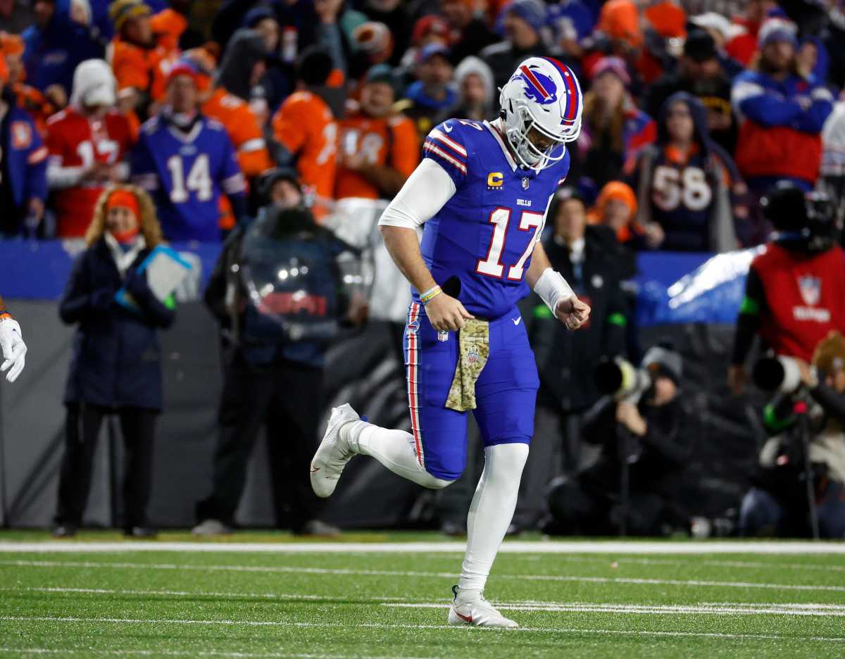 Buffalo Bills quarterback Josh Allen comes off the field after a three and out in a 24-22 loss to Denver.