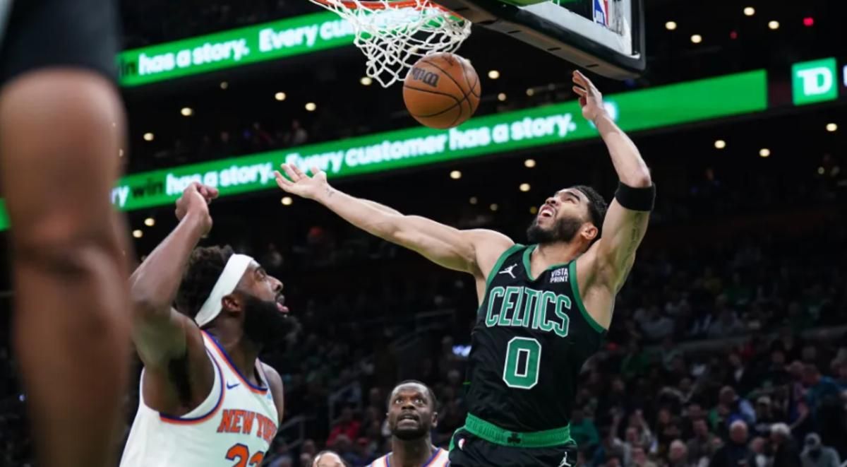 Mitchell Robinson and Julius Randle can only watch as two of Jayson Tatum's 35 points fall in Monday's loss in Boston