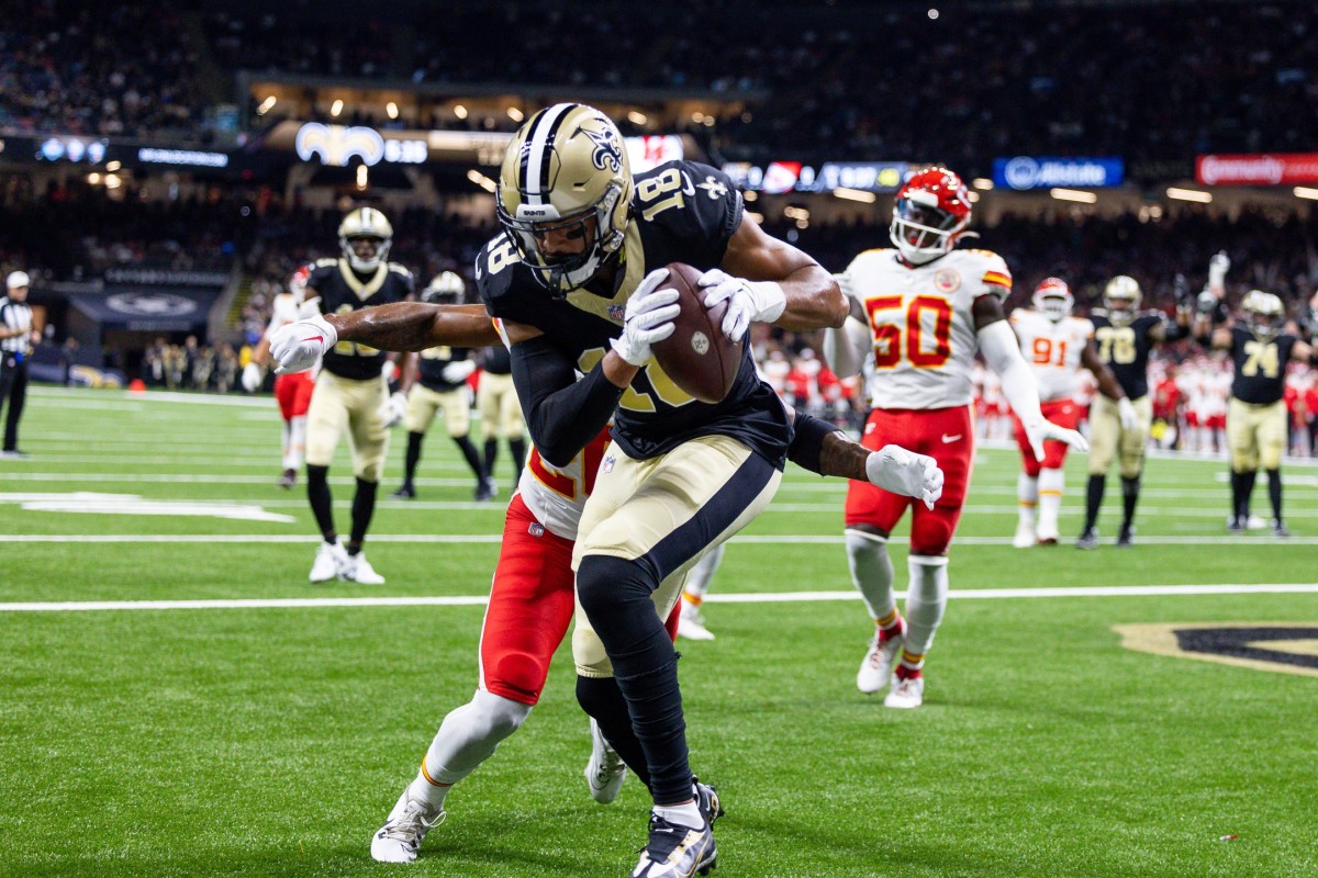 Aug 13, 2023; New Orleans Saints wide receiver Keith Kirkwood (18) catches catches a touchdown against the Kansas City Chiefs. Mandatory Credit: Stephen Lew-USA TODAY Sports