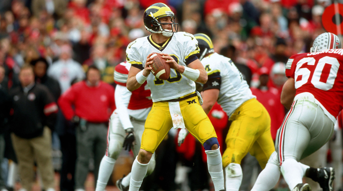 Michigan quarterback Tom Brady (10) in action against the Ohio State Buckeyes at Ohio Stadium in 1998. Ohio St. defeated Michigan 31-16.