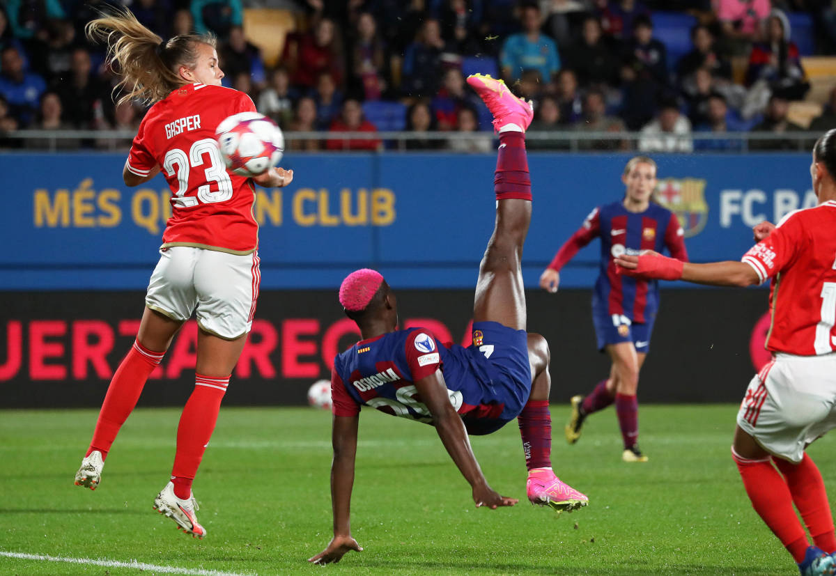 Asisat Oshoala pictured scoring for Barcelona with a bicycle kick against Benfica in the UEFA Women's Champions League in November 2023