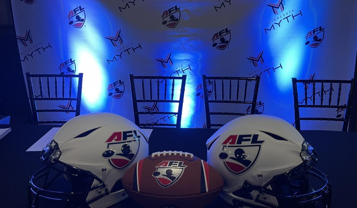 A view of the AFL helmets and football with the Minnesota Myth logos in the background. 