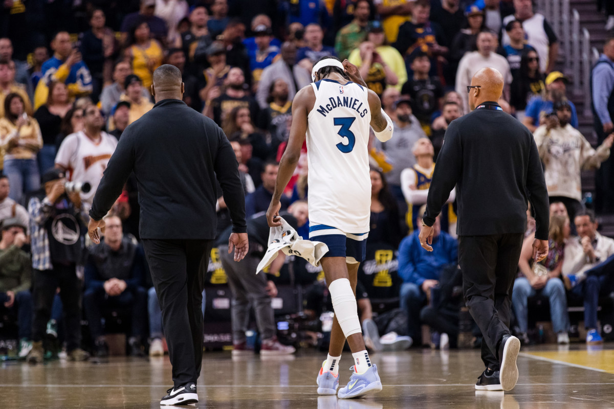 Minnesota Timberwolves forward Jaden McDaniels is ejected from the game along with Golden State Warriors forward Draymond Green and guard Klay Thompson during the first quarter at Chase Center.