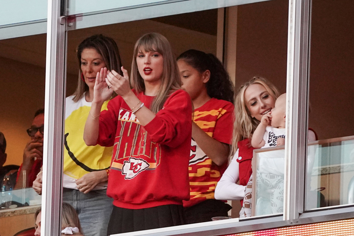 Recording artist Taylor Swift watches play against the Los Angeles Chargers during the game at GEHA Field at Arrowhead Stadium.