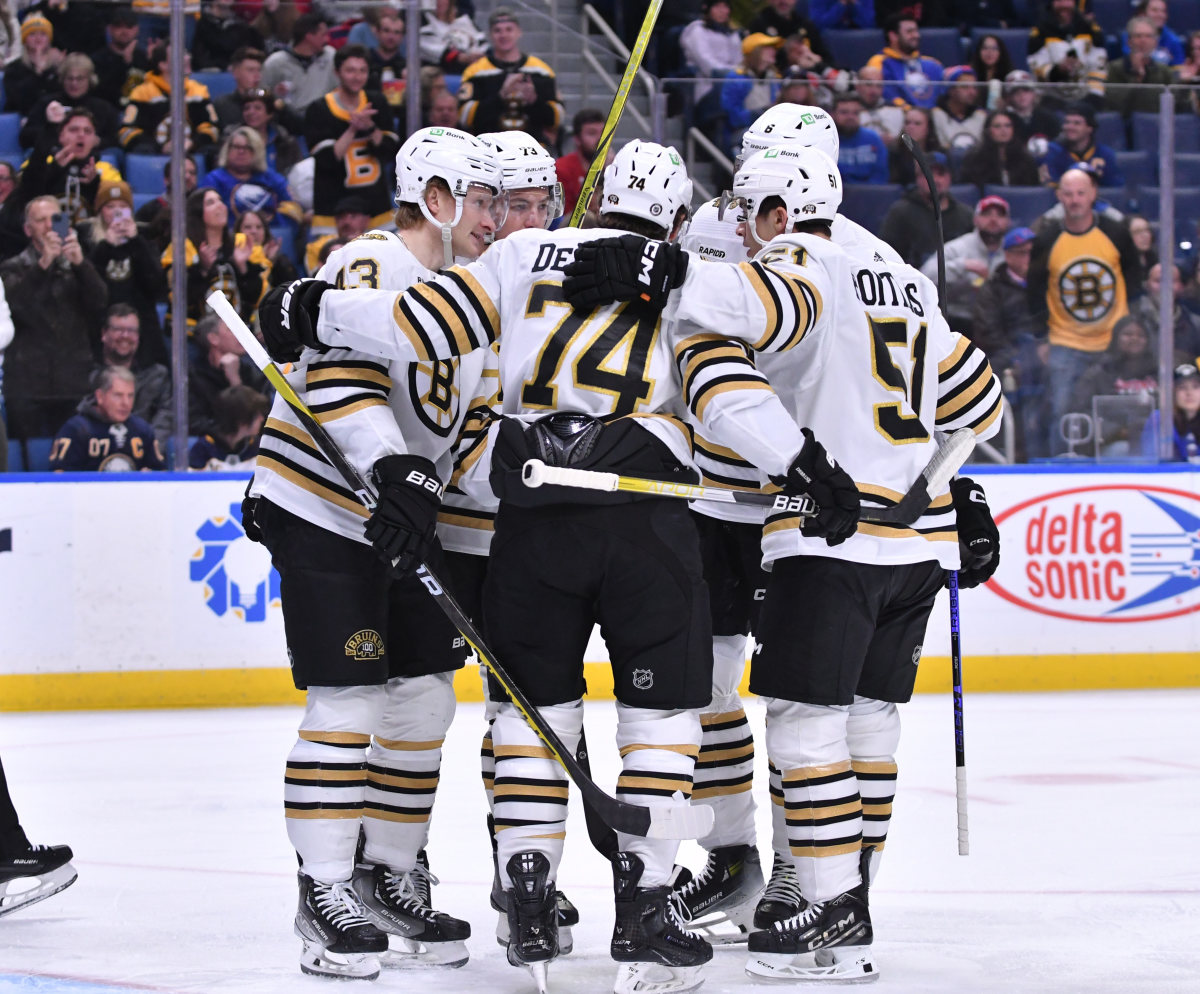 The Boston Bruins celebrates a goal in the first period against the Buffalo Sabres at KeyBank Center.
