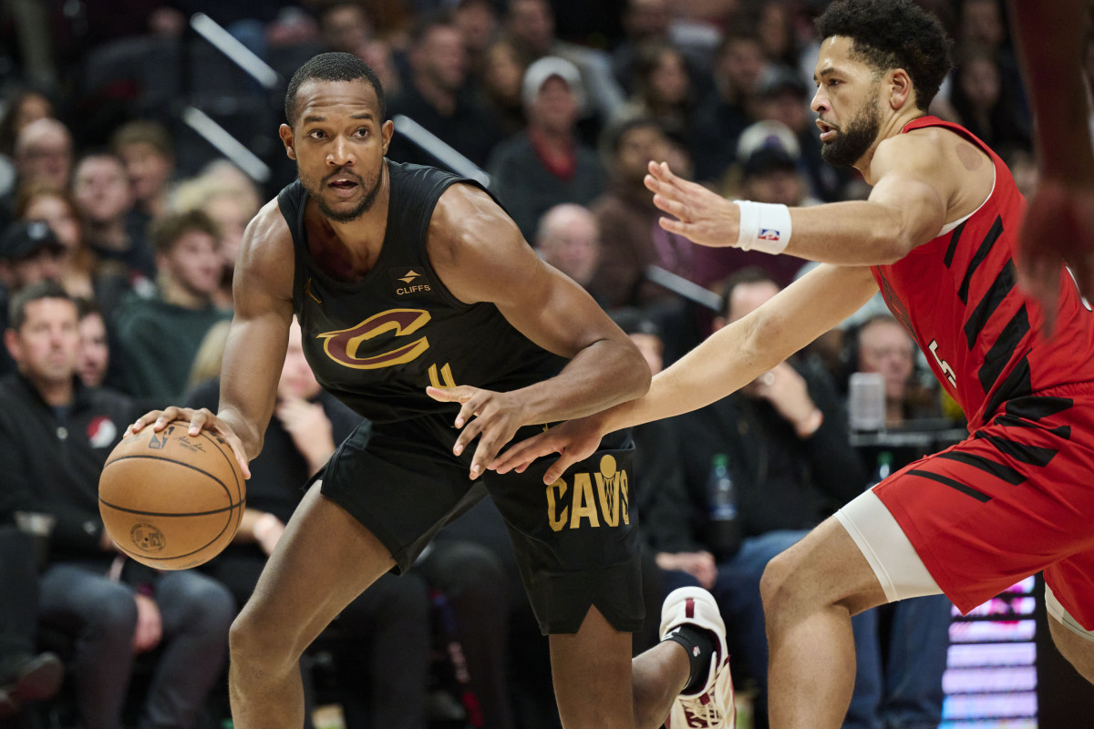Nov 15, 2023; Portland, Oregon, USA; Cleveland Cavaliers forward Evan Mobley (4) drives to the basket during the second half against Portland Trail Blazers guard <a rel=