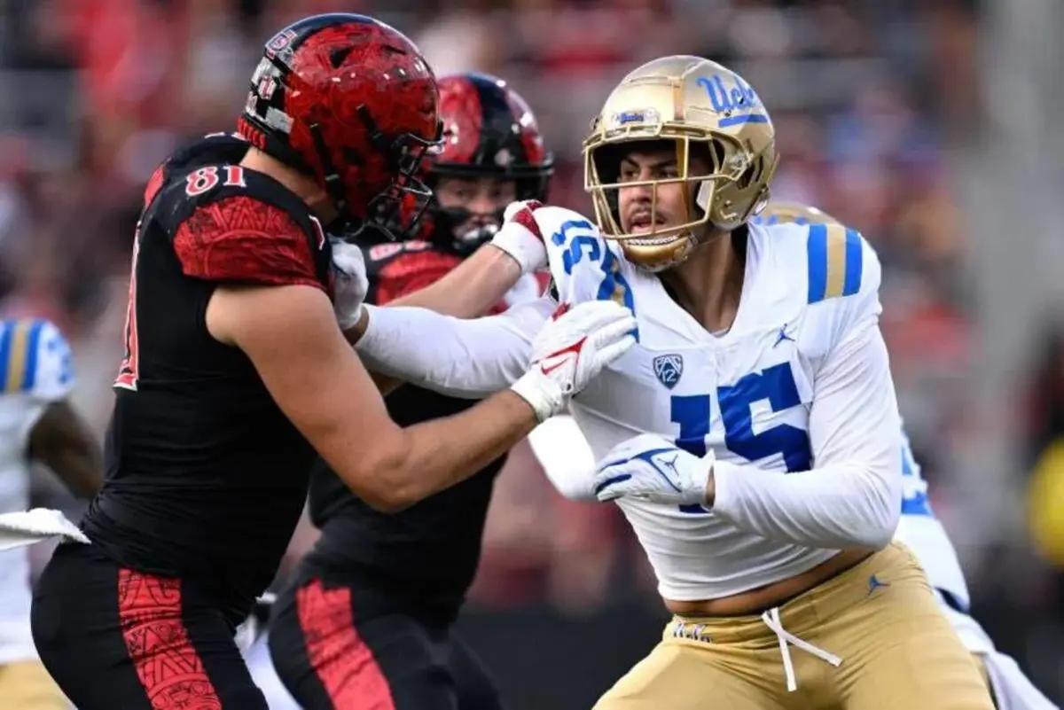 Latu takes on a San Diego State tight end.