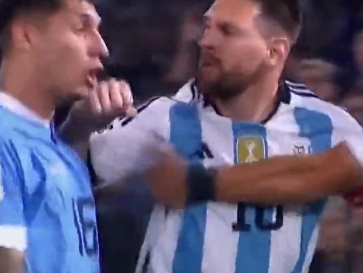 Lionel Messi pictured (right) striking Mathias Olivera during a game between Argentina and Uruguay in November 2023