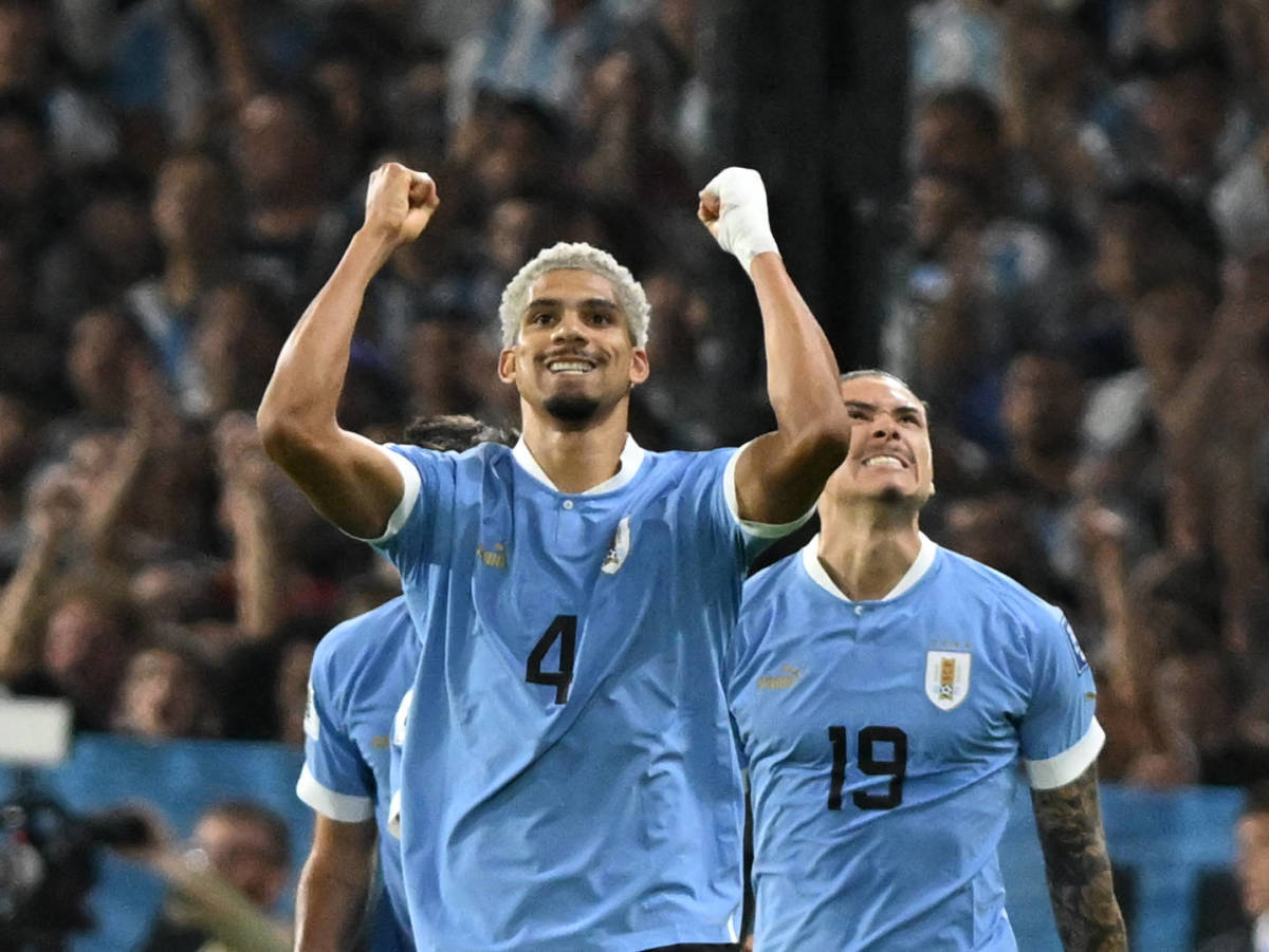 Ronald Araujo (center) and Darwin Nunez (right) pictured celebrating during Uruguay's 2-0 win over Argentina in November 2023