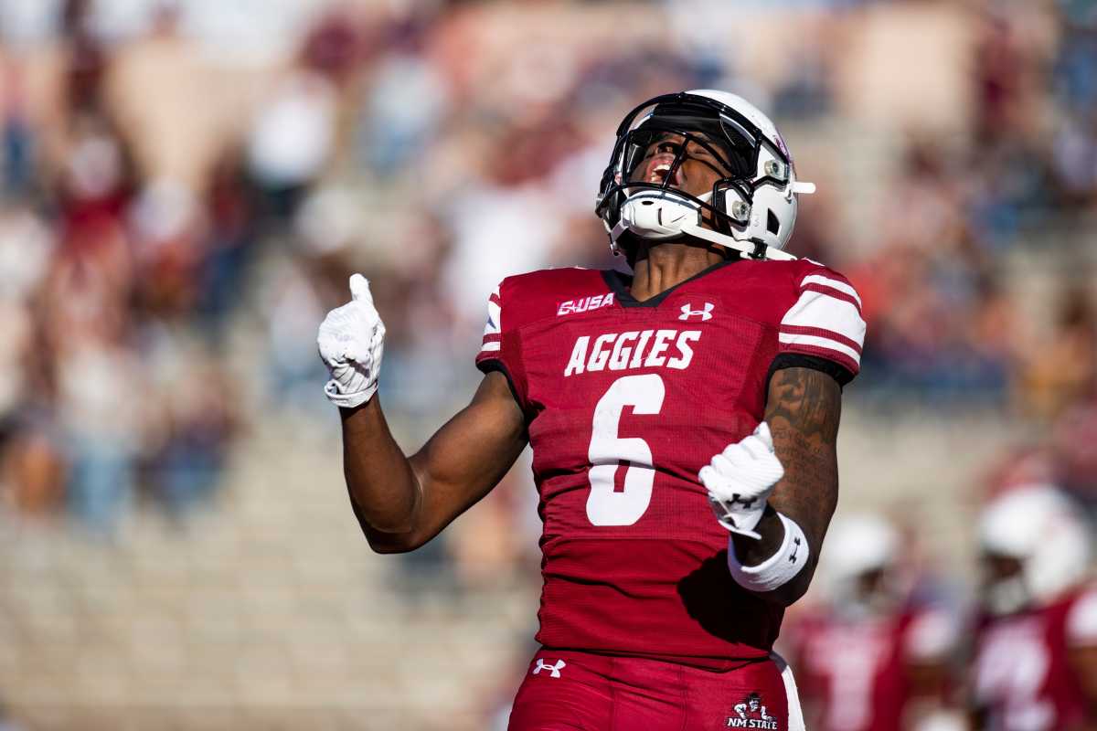 NMSU wide receiver Eli Stowers celebrates the first touchdown of the game during the NMSU homecoming game on Saturday, Nov. 4, 2023, at the Aggie Memorial Stadium.  