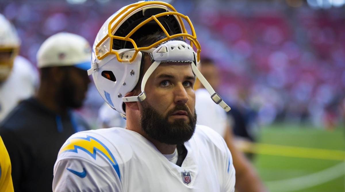 Chargers quarterback Chase Daniel looks up while on the sidelines during a game.