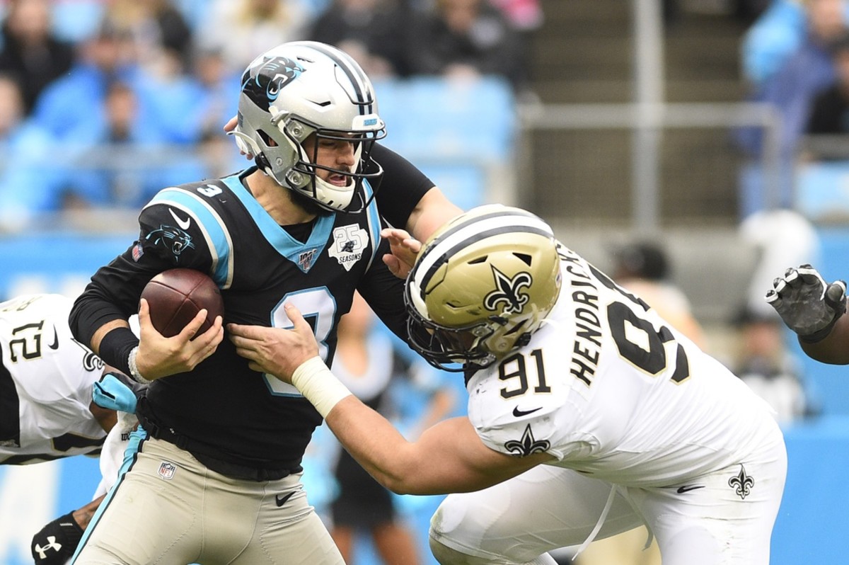 Dec 29, 2019; Carolina Panthers quarterback Will Grier (3) is sacked by New Orleans Saints defensive end Trey Hendrickson (91). Mandatory Credit: Bob Donnan-USA TODAY Sports