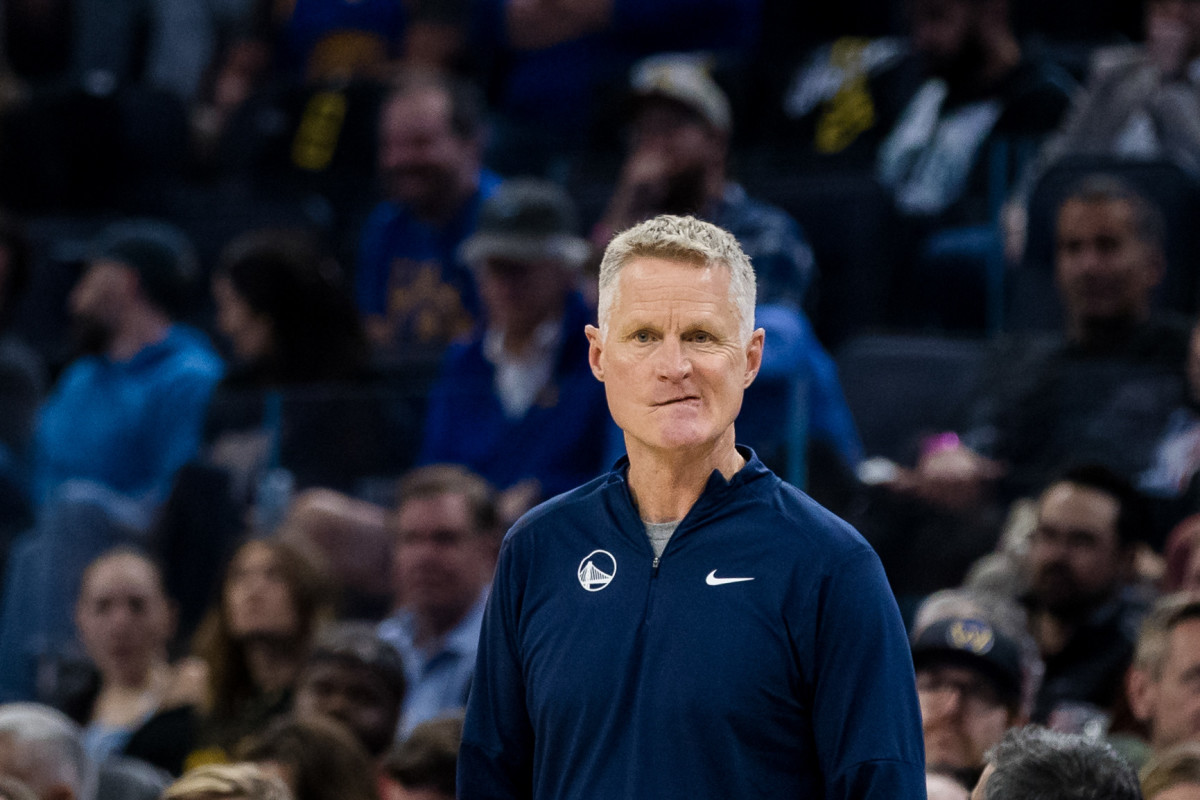 Nov 14, 2023; San Francisco, California, USA; Golden State Warriors head coach Steve Kerr watches a free throw by a Minnesota Timberwolves player during the first half at Chase Center.