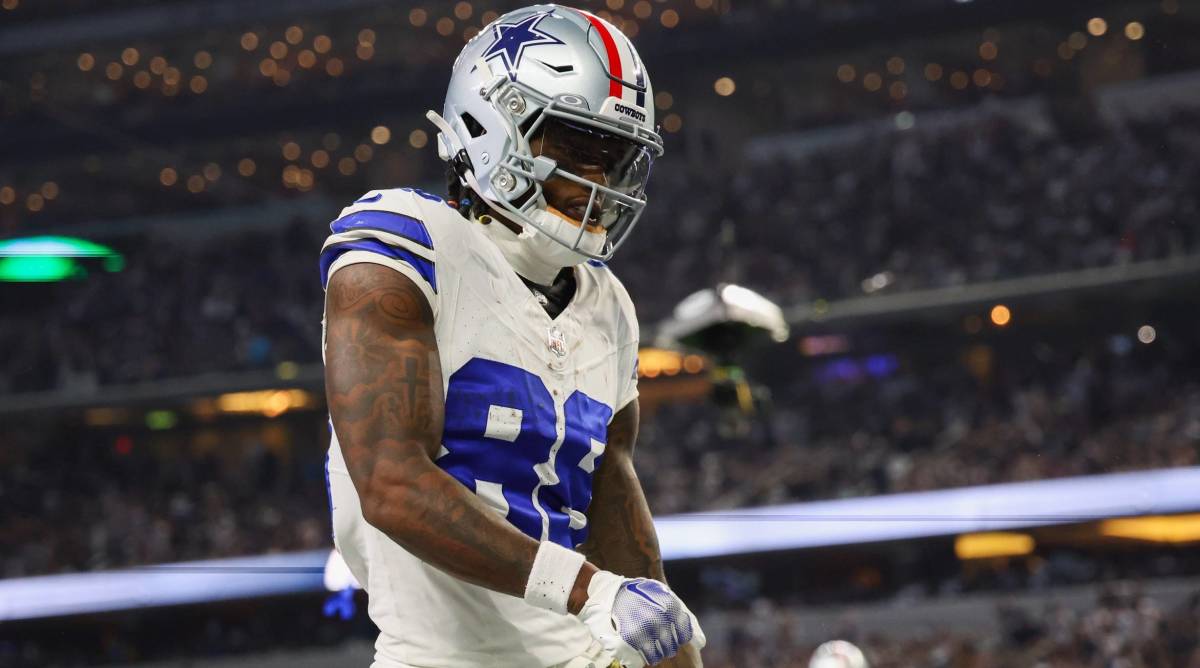 Cowboys wide receiver CeeDee Lamb celebrates after scoring a touchdowns in a game vs. the Giants.