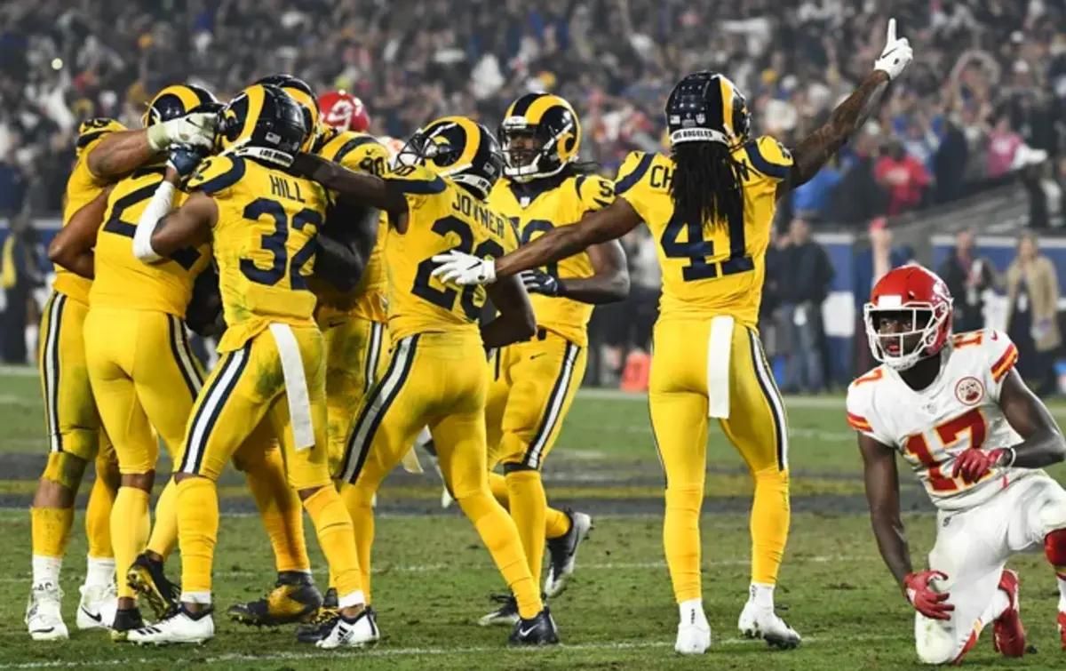 Players celebrate an interception by former Rams cornerback Marcus Peters (22) during that 2018 game.