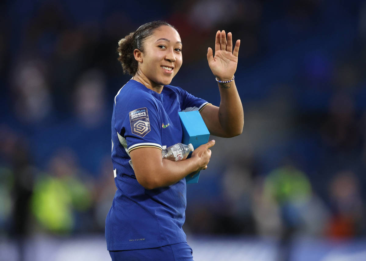 Lauren James pictured waving at fans while holding her Player of the Match award after scoring three goals in Chelsea's 5-1 win over Liverpool at Stamford Bridge in November 2023