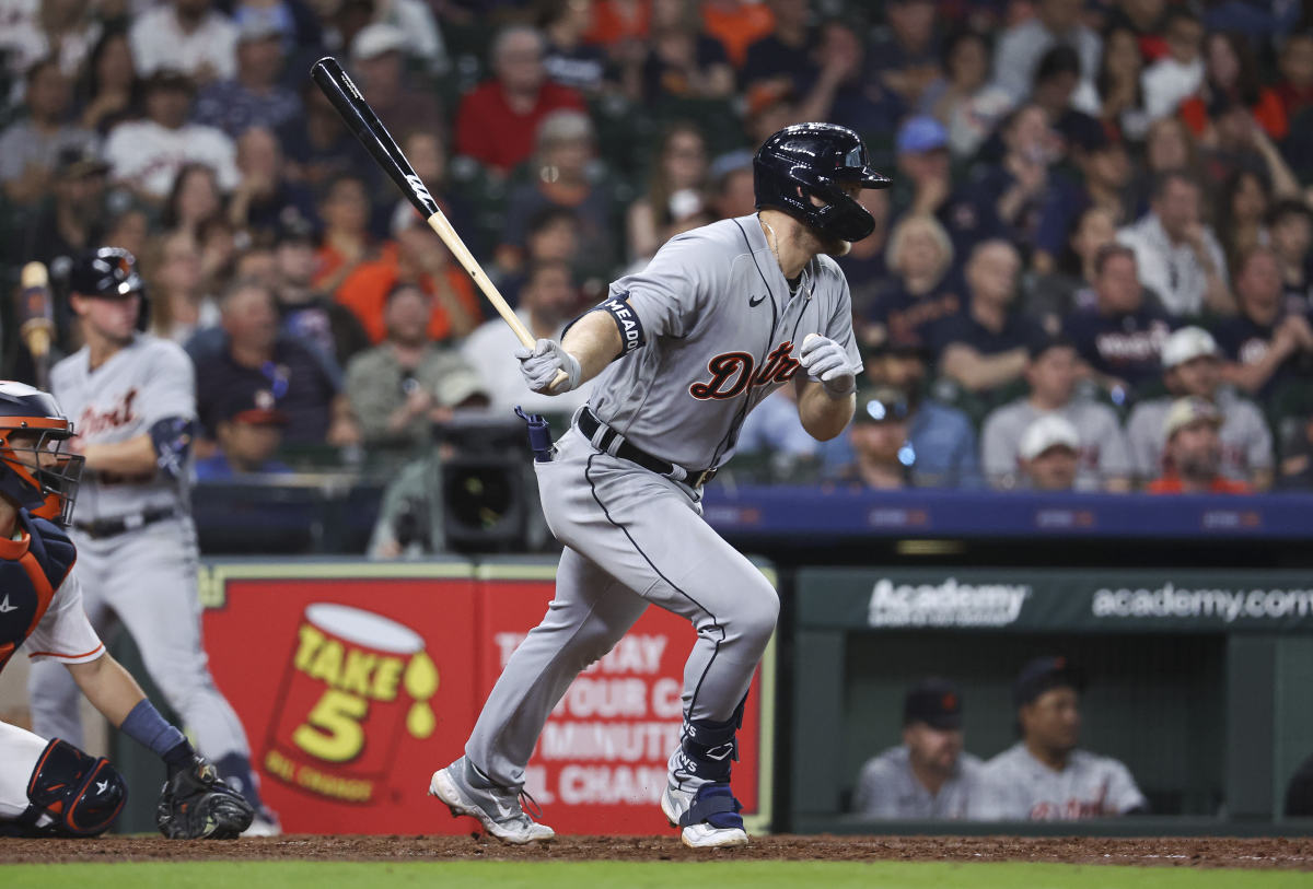Apr 5, 2023; Houston, Texas, USA; Detroit Tigers left fielder Austin Meadows (17) hits an RBI single during the eighth inning against the Houston Astros at Minute Maid Park.