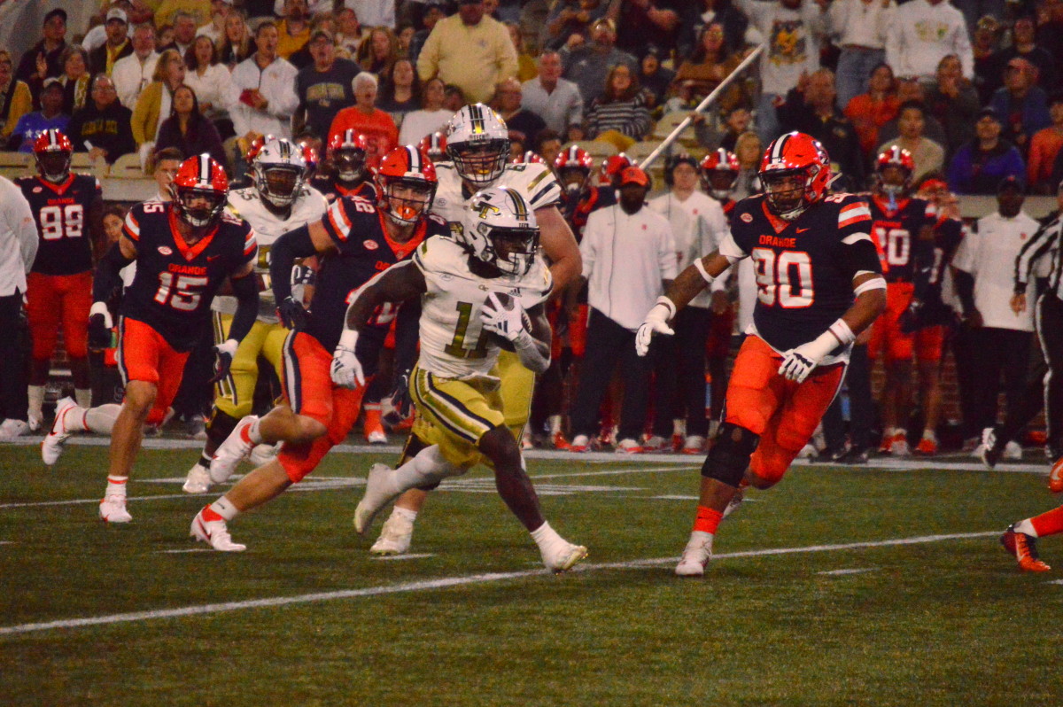 Jamal Haynes running the ball against Syracuse