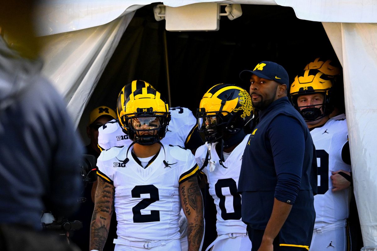 Blake Corum, Mike Sainristil, Sherrone Moore