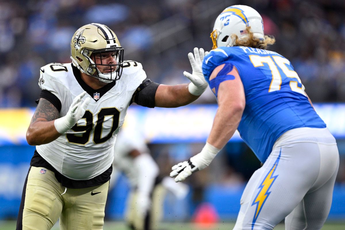 Los Angeles Chargers guard Austen Pleasants (75) blocks New Orleans Saints defensive tackle Bryan Bresee