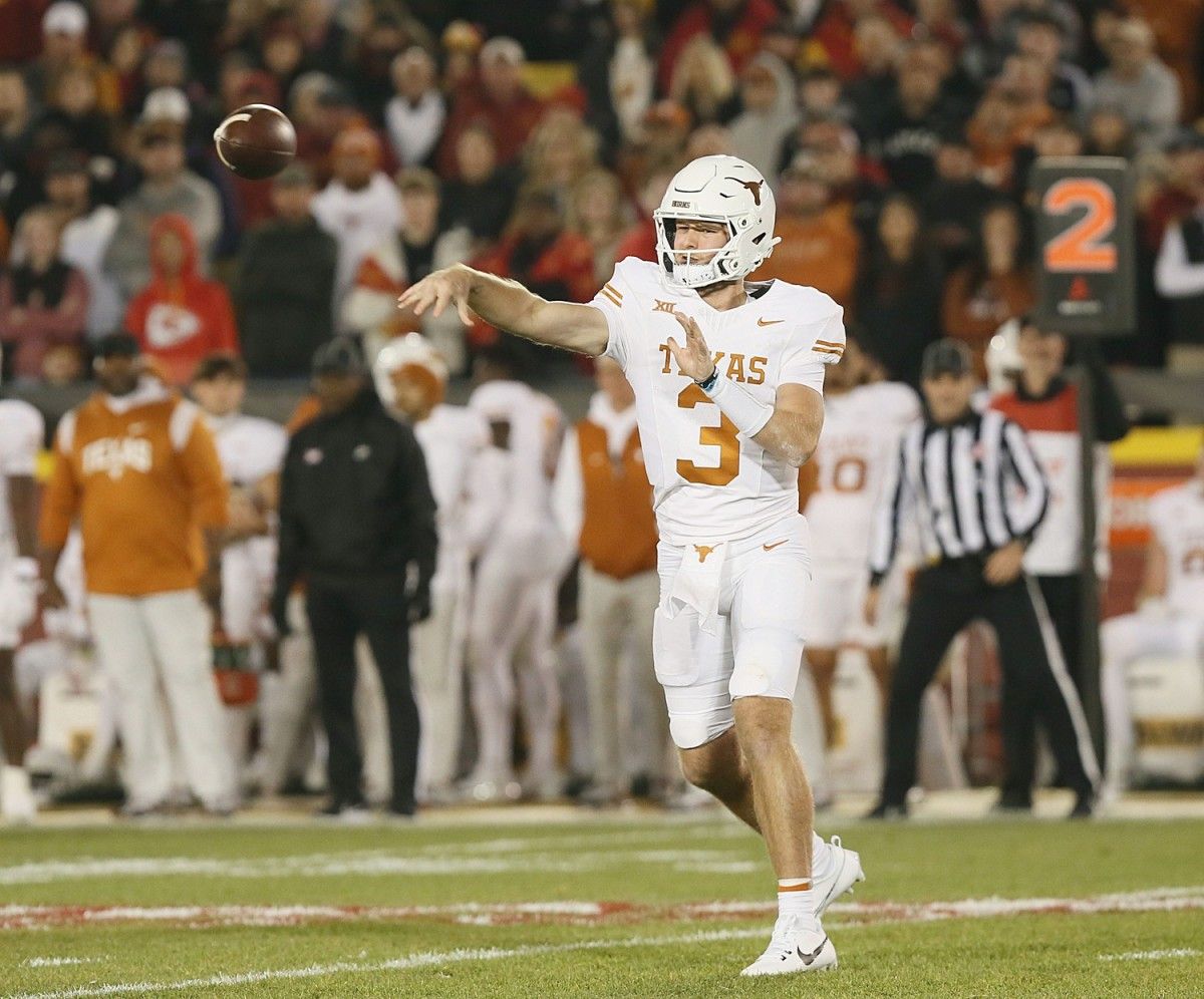 Texas Longhorns quarterback Quinn Ewers (3) throws a pass against Iowa State during the third quarter in the Big-12 football showdown at Jack Trice Stadium on Saturday, Nov. 18, 2023, in Ames, Iowa.