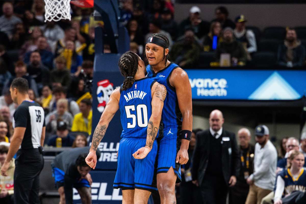 Orlando Magic forward Paolo Banchero (5) celebrates his made slam dunk with guard Cole Anthony (50) in the first half against the Indiana Pacers at Gainbridge Fieldhouse.