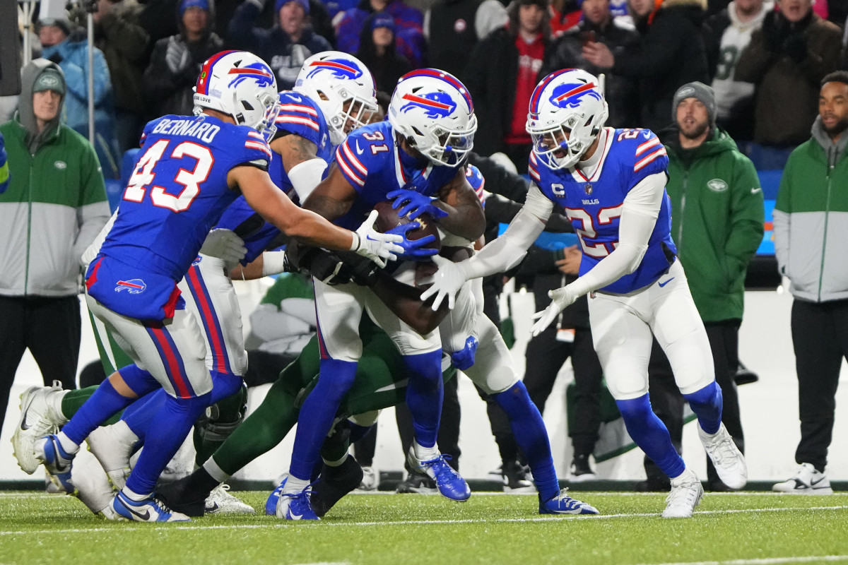 Buffalo Bills cornerback Rasul Douglas (31) recovers a fumble by New York Jets wide receiver Garrett Wilson (17) (not pictured) during the second half at Highmark Stadium.