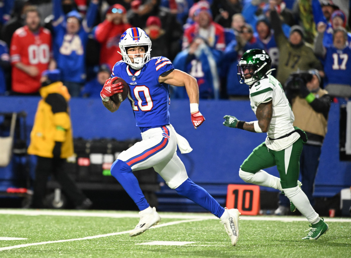Buffalo Bills wide receiver Khalil Shakir (10) runs for a touchdown after catching a pass as New York Jets safety Jordan Whitehead (3) pursues in the third quarter at Highmark Stadium.