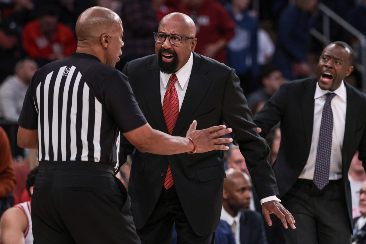 Indiana Hoosiers coach Mike Woodson talks with an official during the first half against the Connecticut Huskies at Madison Square Garden.