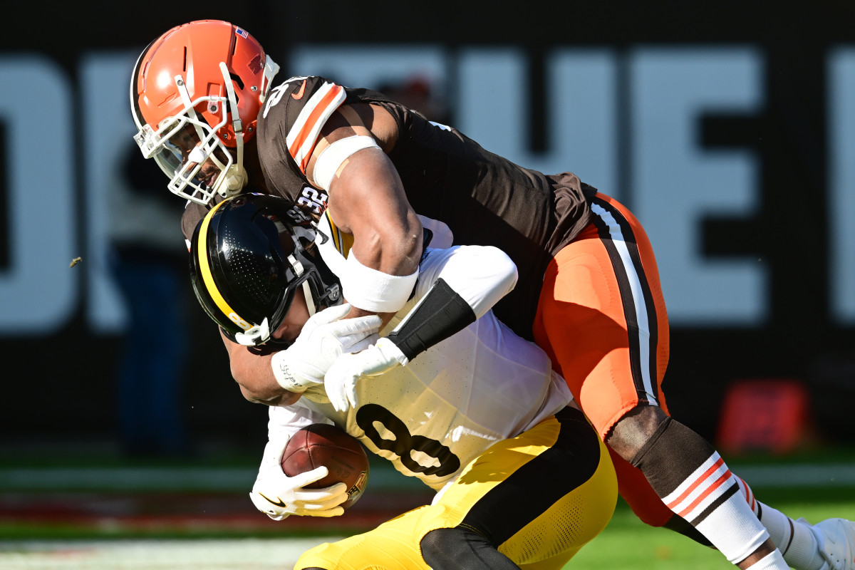 Cleveland Browns defensive end Myles Garrett sacks Pittsburgh Steelers quarterback Kenny Pickett during the first quarter at Cleveland Browns Stadium.