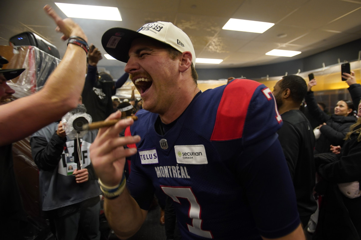 Nov 19, 2023; Hamilton, Ontario, CAN; Montreal Alouettes quarterback Cody Fajardo (7) celebrates with a cigar after winning the 110th Grey Cup against the Winnipeg Blue Bombers at Tim Hortons Field. Mandatory Credit: John E. Sokolowski-USA TODAY Sports